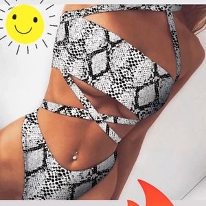 Snakeprint strappy swimsuit. Available in 2 colors